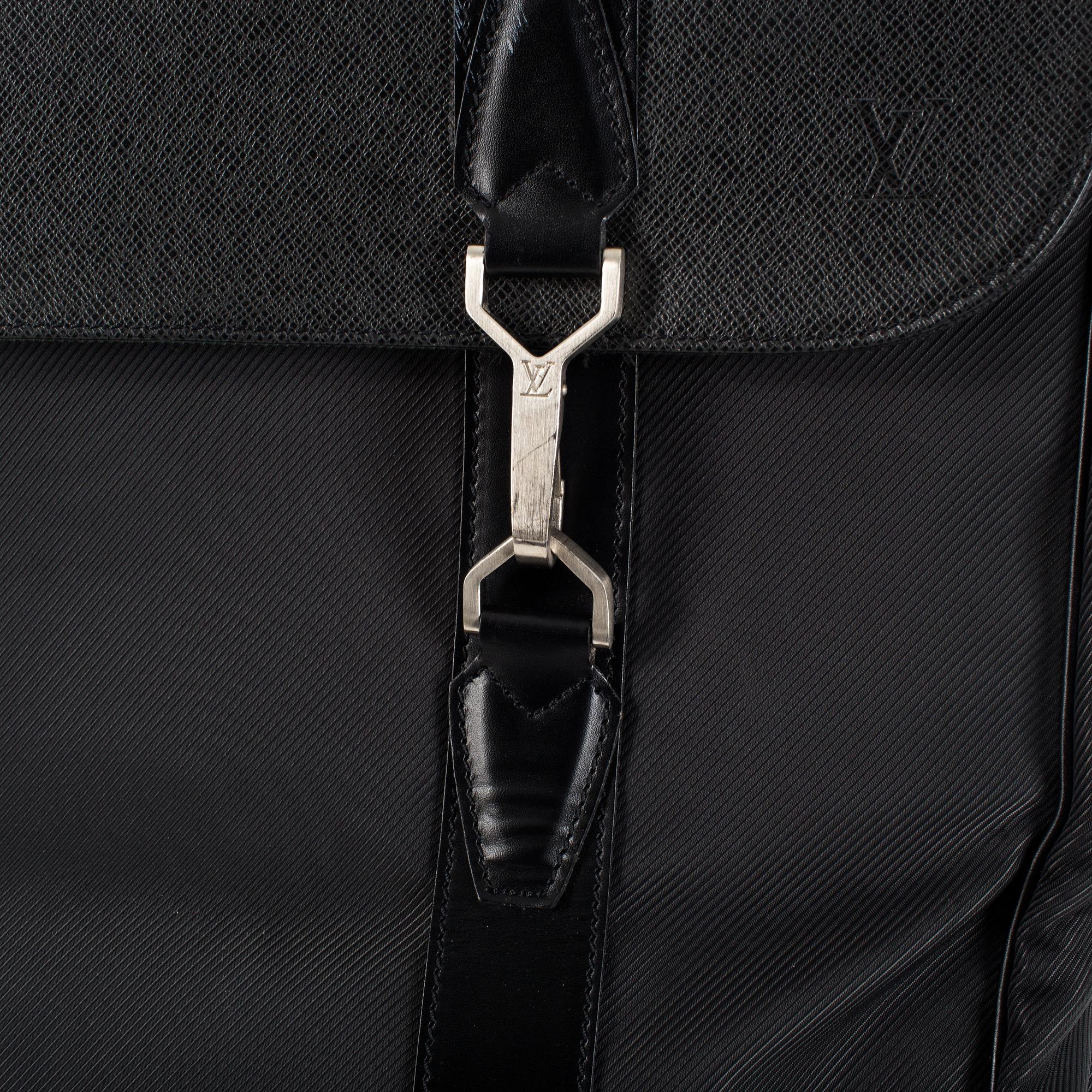 Garment cover 2 hangers from Louis Vuitton.