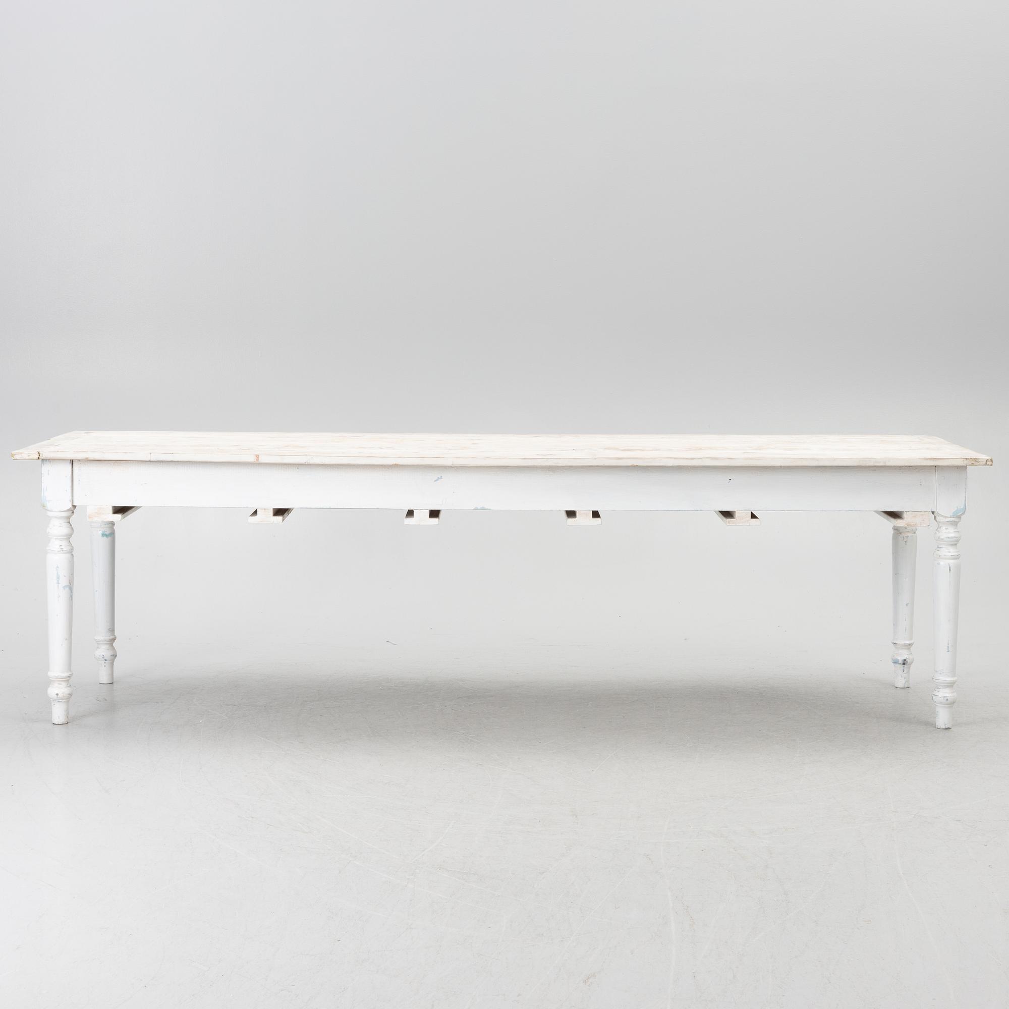 A table with stools, 20th/21st century.