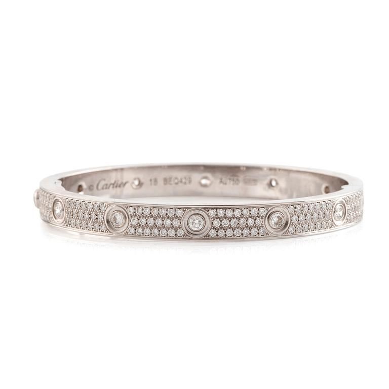 A Cartier "Love" bracelet in 18K white gold set with round brilliant-cut diamonds.