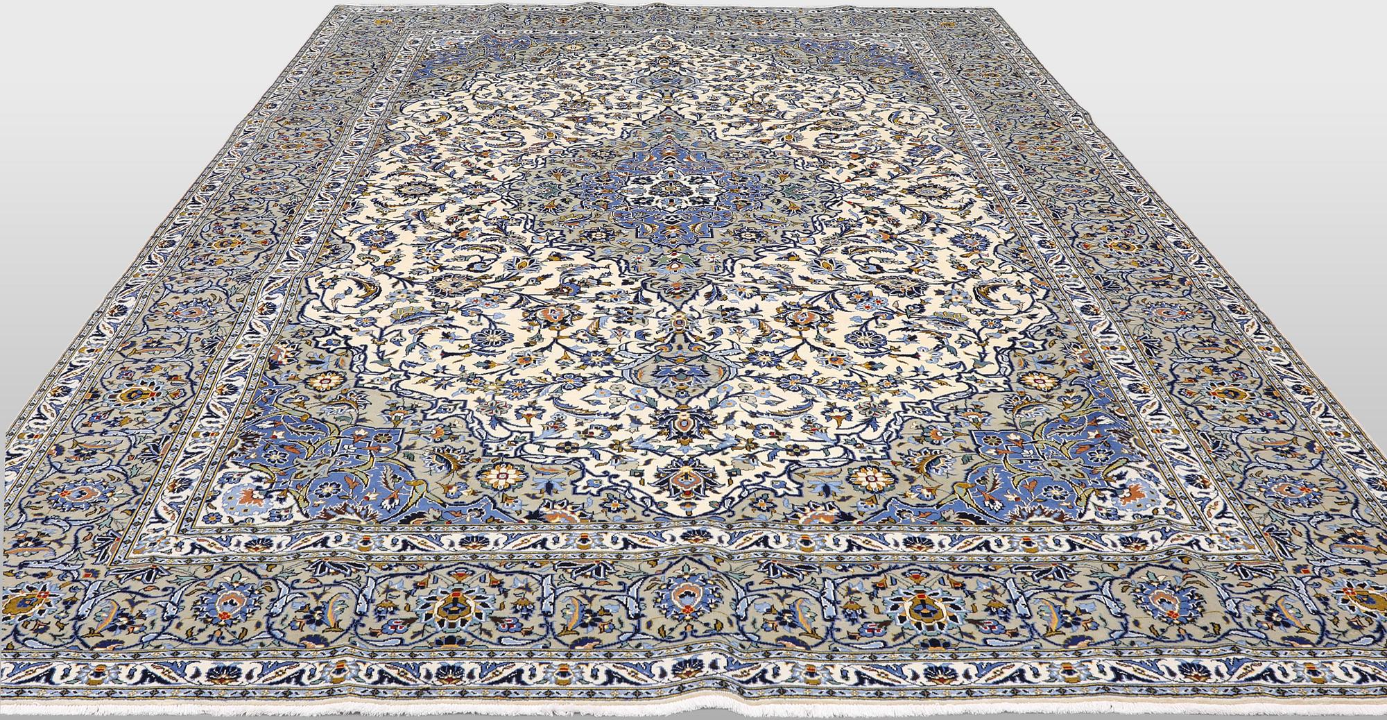 A Keshan carpet, signed, 386 x 281 cm.