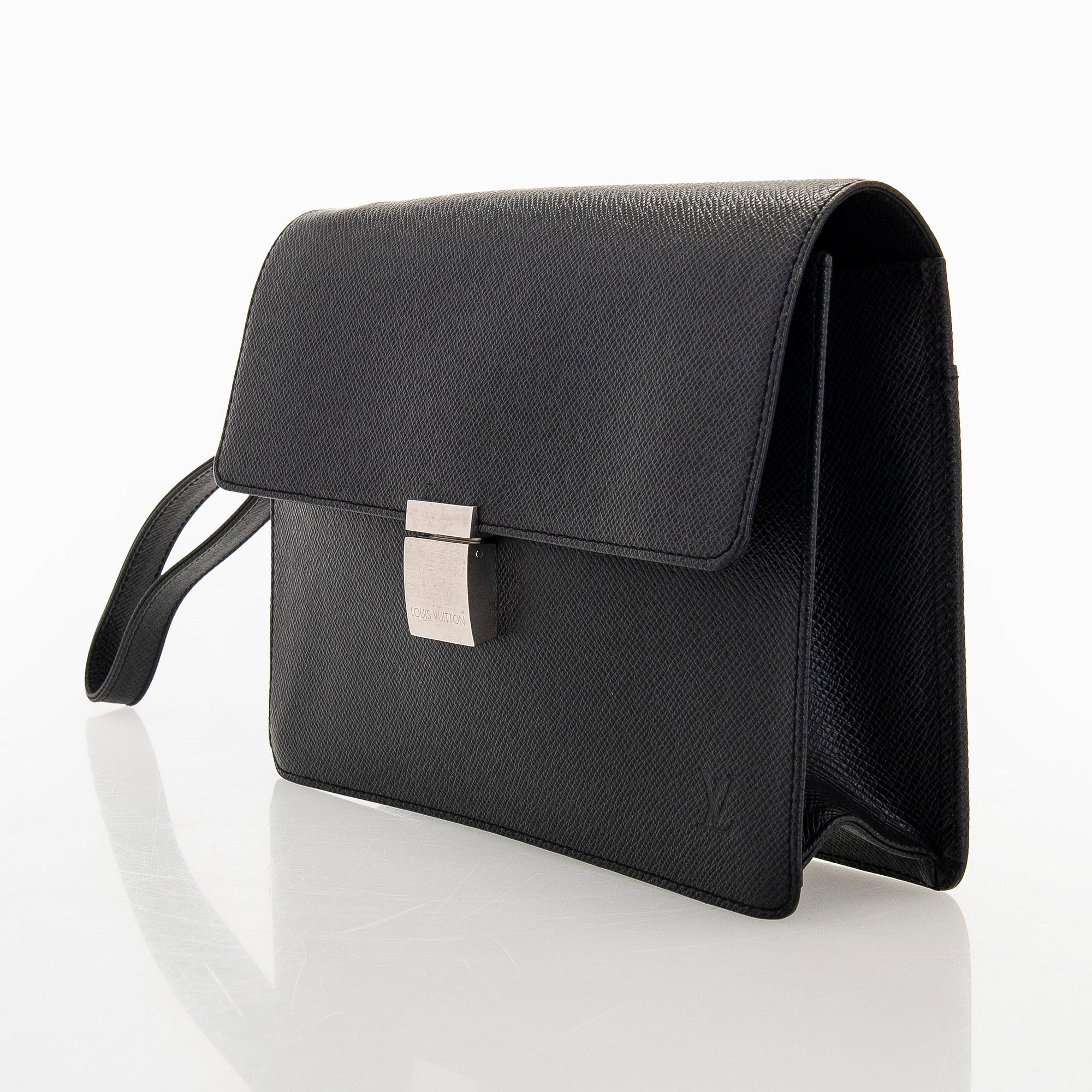 Louis Vuitton, a 'Selenga' clutch bag.