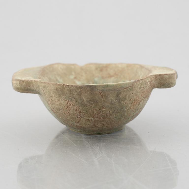 A Chinese glazed ceramic dish, Han dynasty (206 B.C-220 A.D.).