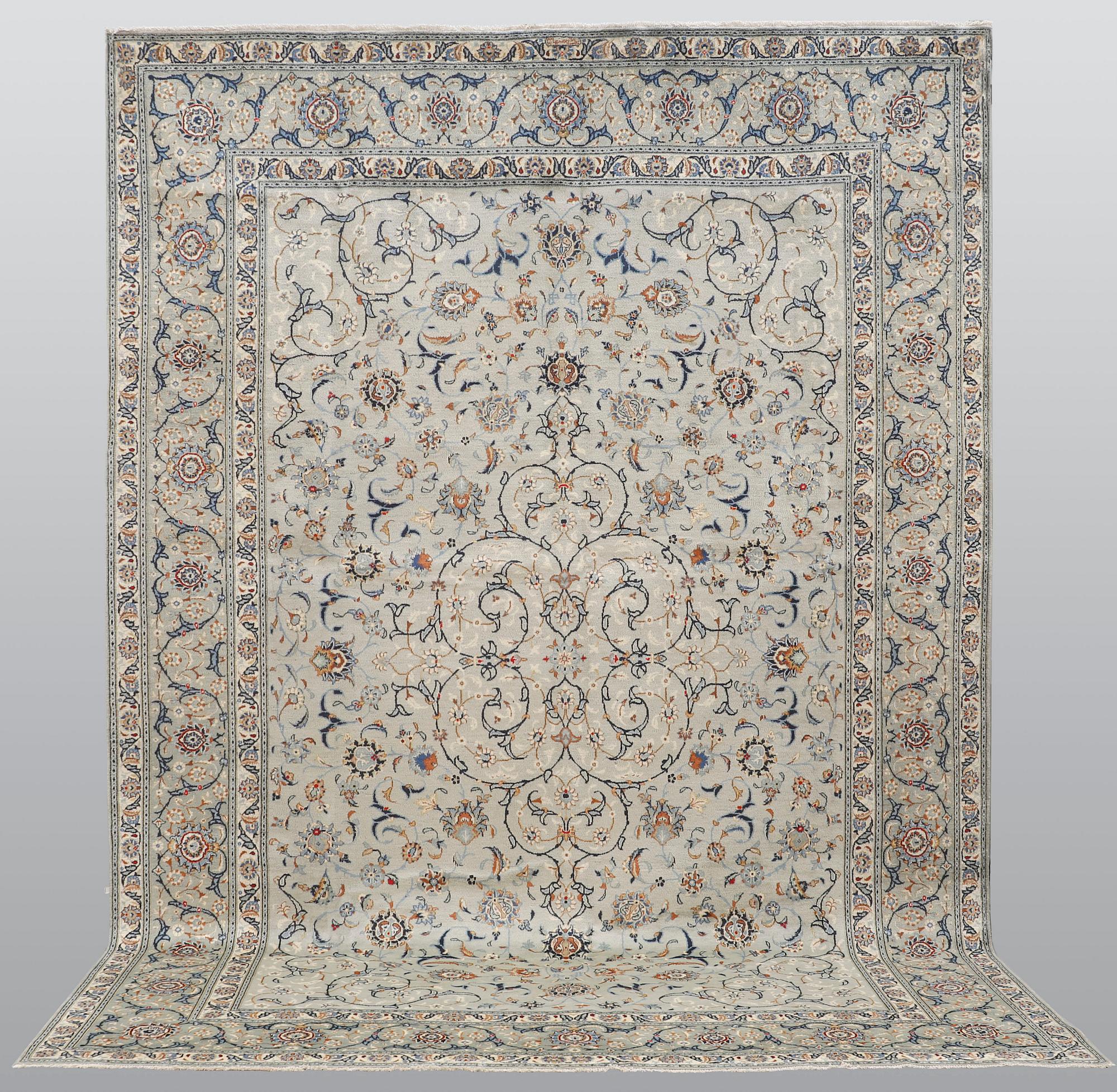 A carpet, Kashan, signed, ca 404 x 280 cm.