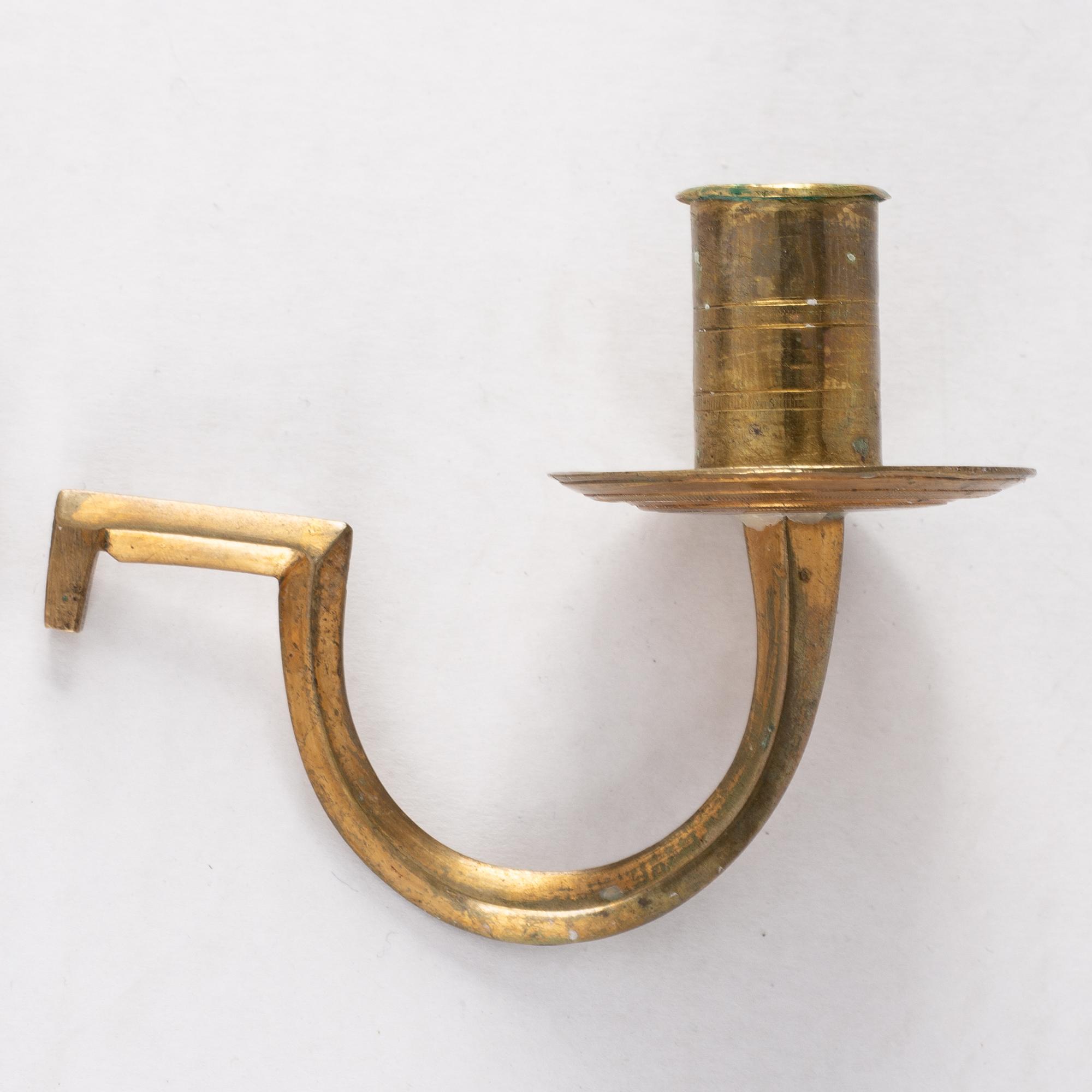 A pair of Swedish Empire mirror wall sconces, first half of the 19th century.