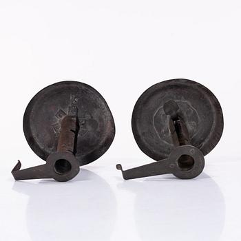 A pair of similar candle holders, 19th century.
