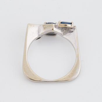 Navette and oval sapphire and diamond ring.
