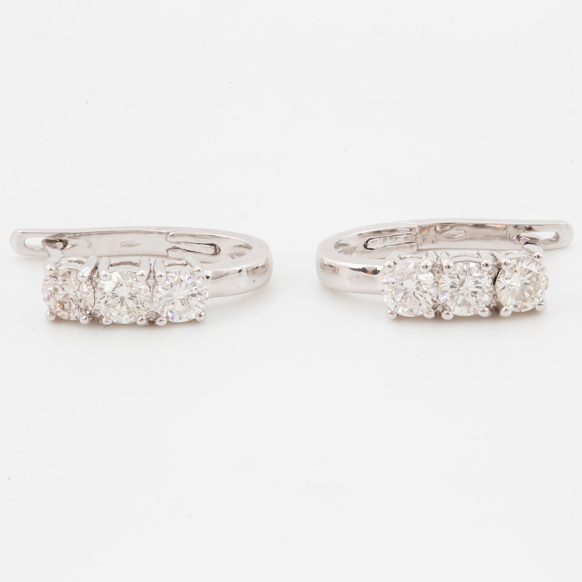 Brilliant-cut diamond earrings.