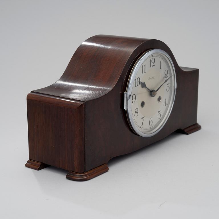 A GERMAN MANTEL CLOCK MAUTHE.