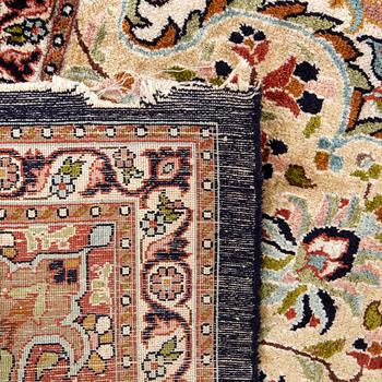 An old Ghom silk carpet ca 368 x 273 cm.