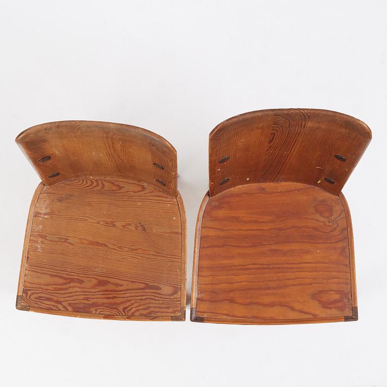 Axel Einar Hjorth, a pair of stained pine 'Lovö' chairs, Nordiska Kompaniet, Sweden 1930s.