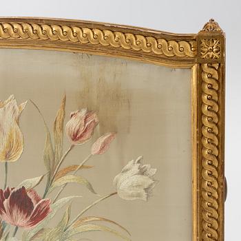 A Louix XVI-style fire guard, late 19th century.