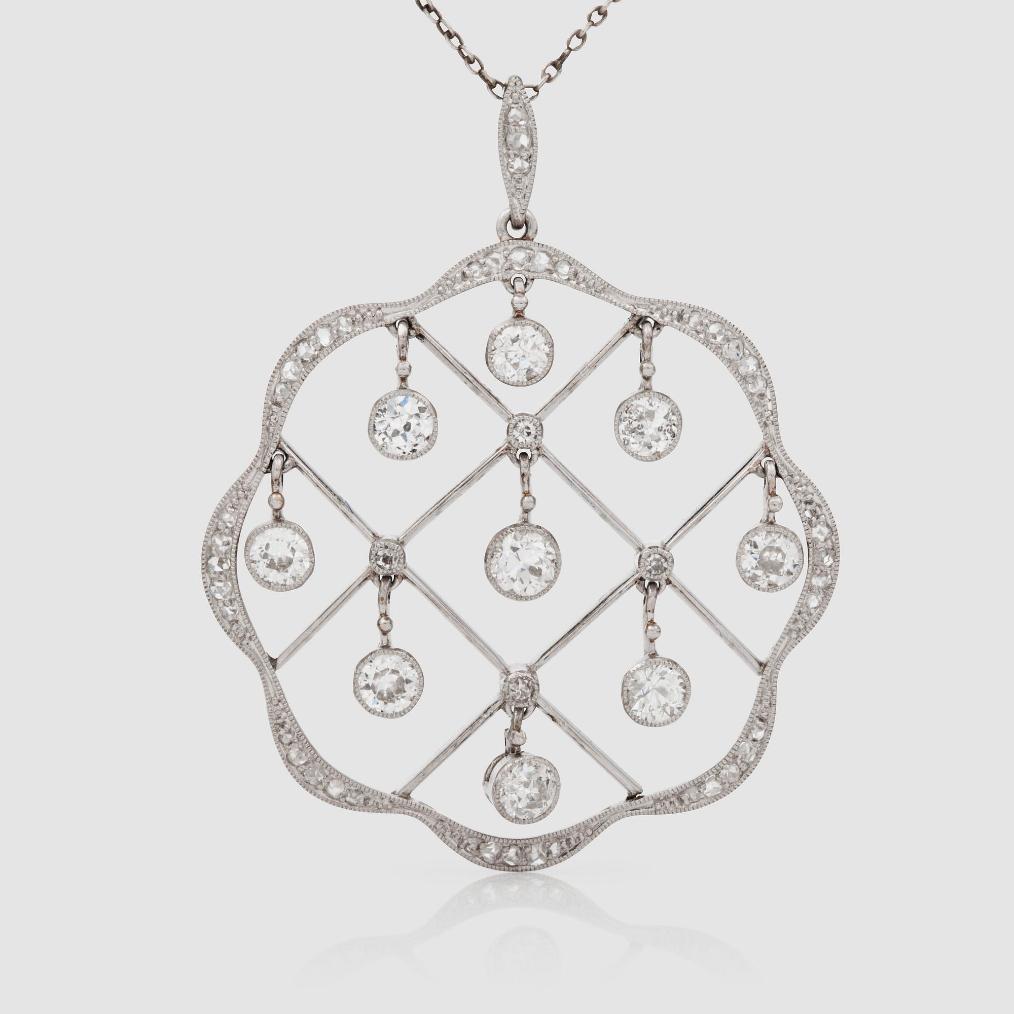COLLIER med hängande gammalslipade samt rosenslipade diamanter "en tremblant" totalt ca 1.25 ct.