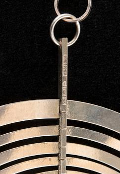 Tapio Wirkkala, A PENDANT, silver, "Silver Moon", N. Westerback, Helsinki 1971. Weight 45 g.