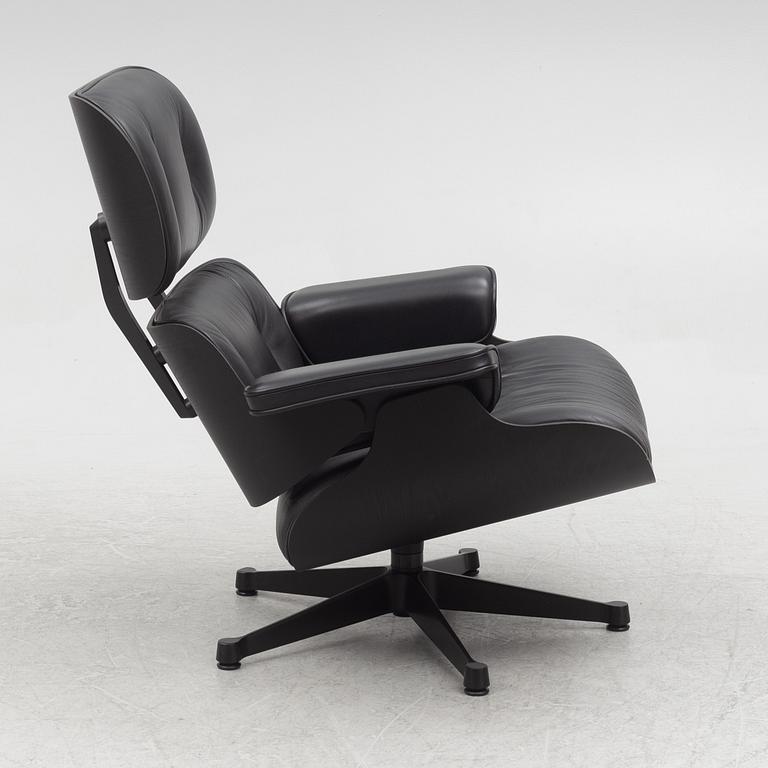 Charles & Ray Eames, an "Eames Lounge Chair" with ottoman, Vitra, 21st century.