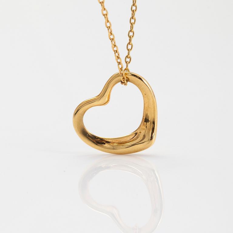 Tiffany & Co, Elsa Peretti, an 18K gold 'Open Heart' necklace.