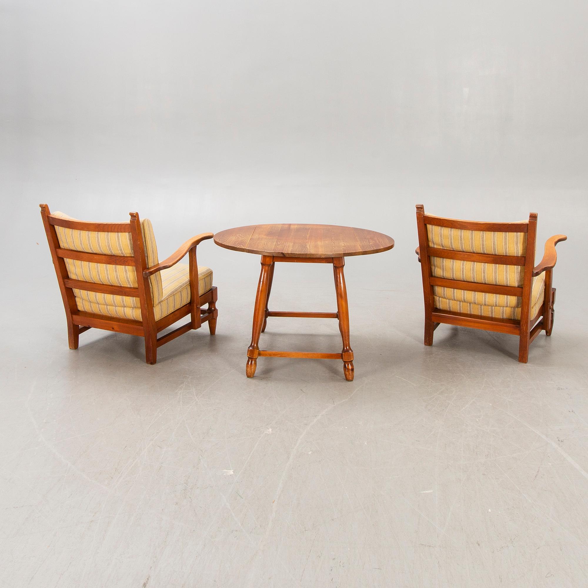 A set of two "Åre" armchairs and table by Gunnar Göpert 1940/50s.