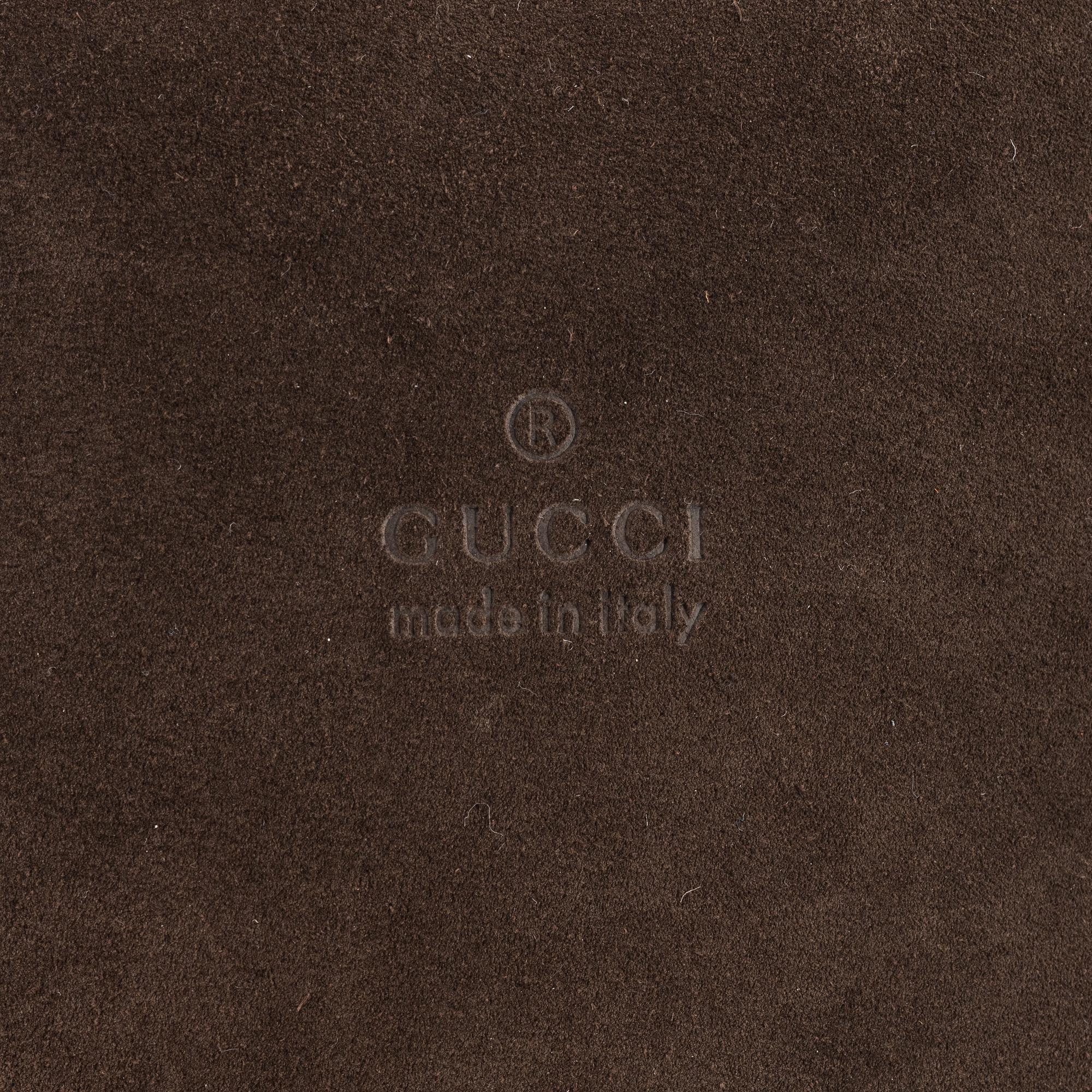 Gucci, a Bamboo suede bag.