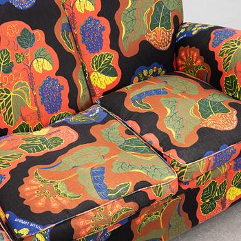 A model 703 sofa by Josef Frank for Firma Svenskt Tenn.