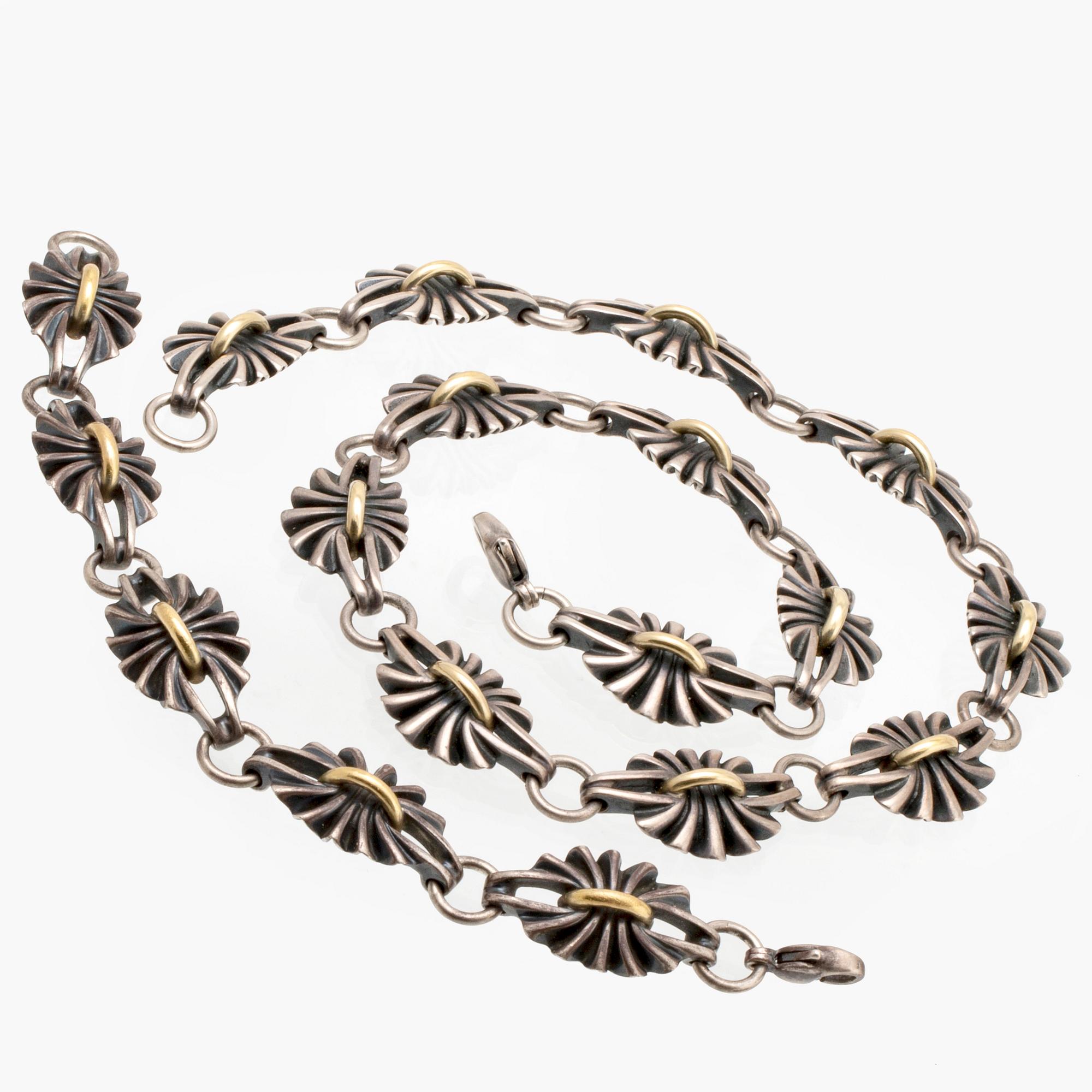 Georg Jensen necklace and bracelet, sterling silver and 18K gold, nr 394.