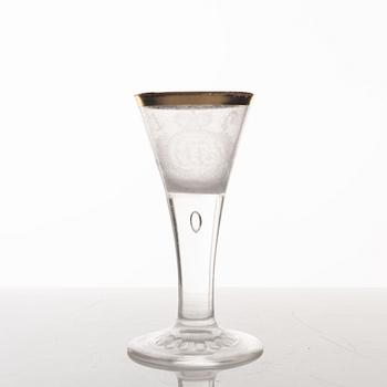 A presumably German engraved and gilt rococo glass, mid 18th century.