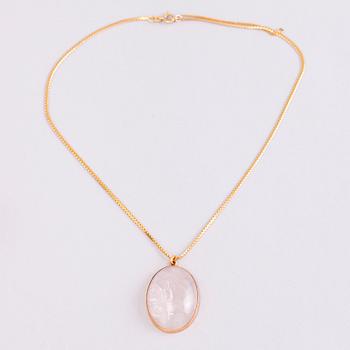 A 1950s three piece jewellery set with 14K gold and rose quartz.