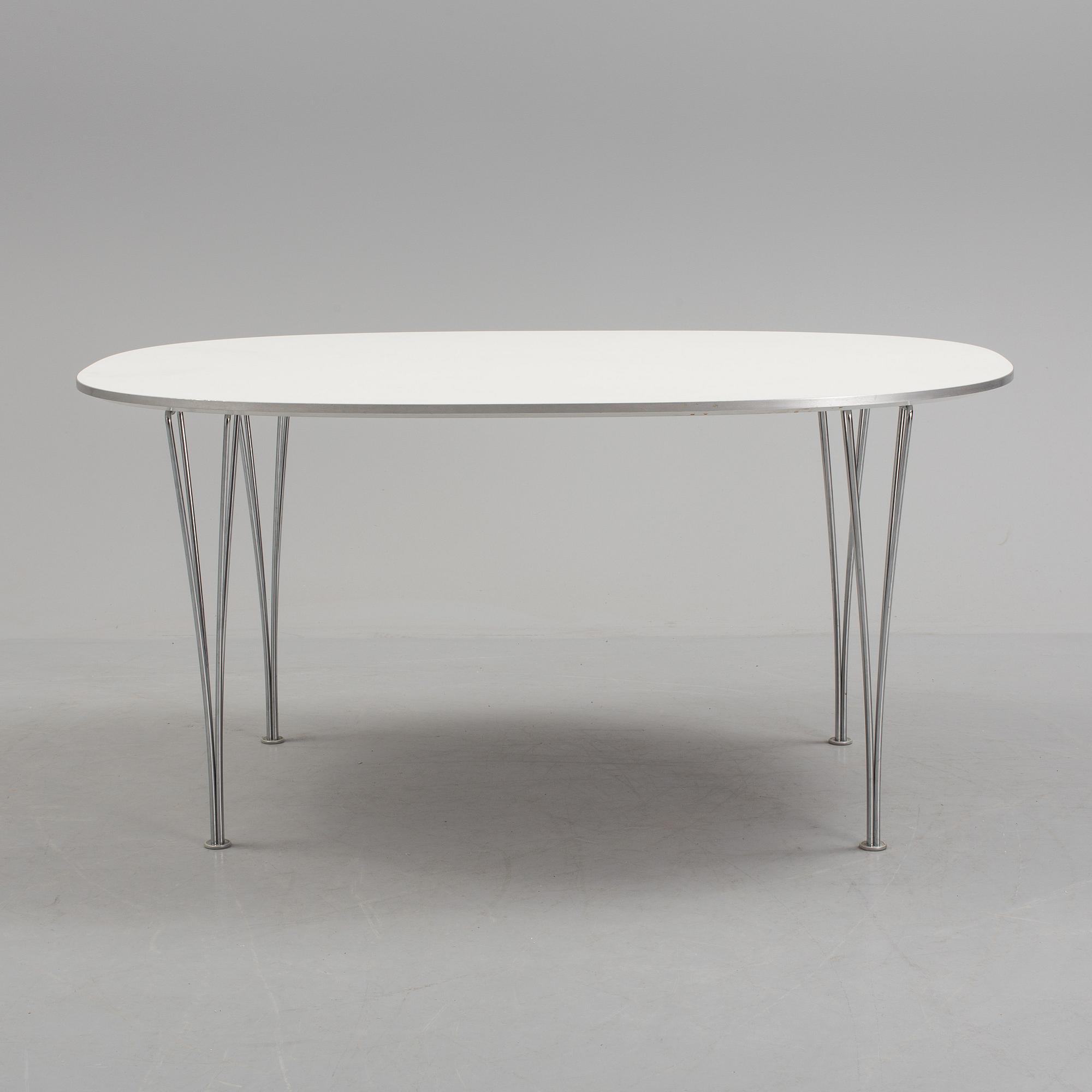 BRUNO MATHSSON AND PIET HEIN, a 'Superellips' dining table from Fritz Hansen, 2005.