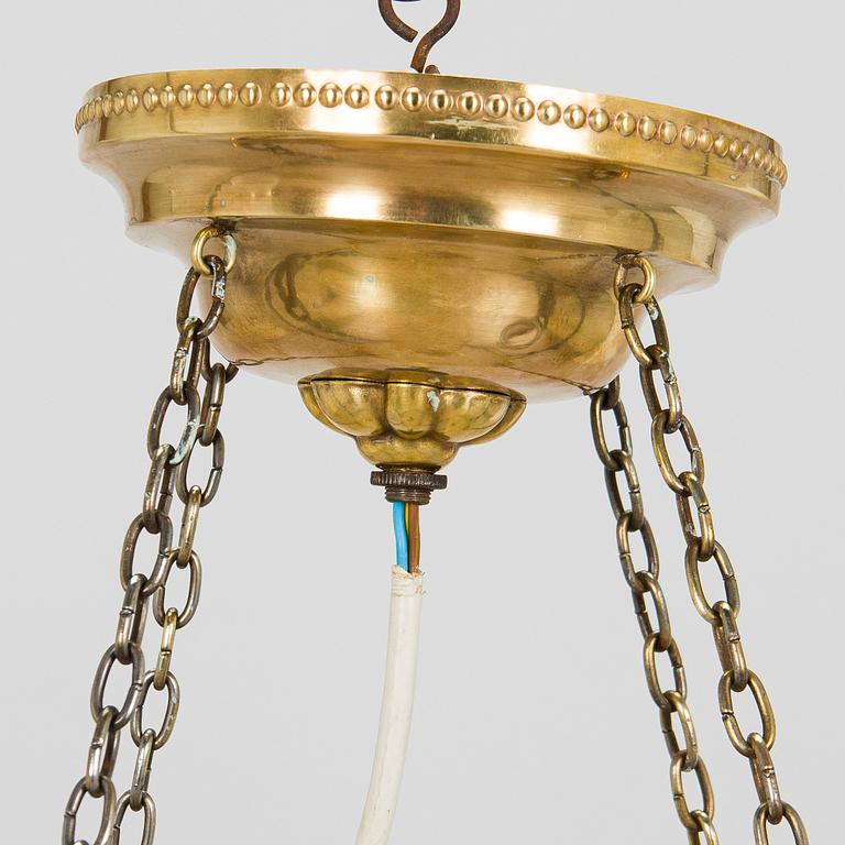 Kattovalaisin, 1900-luvun alku.