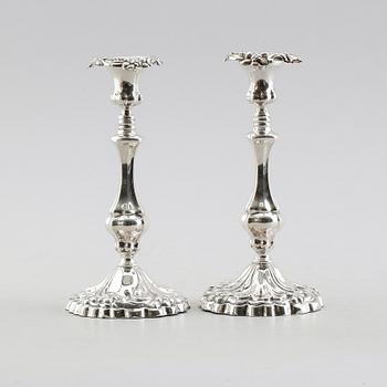 LJUSSTAKAR, ett par, silver, 1861.