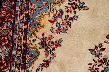 An oriental carpet, c. 370x260 cm.