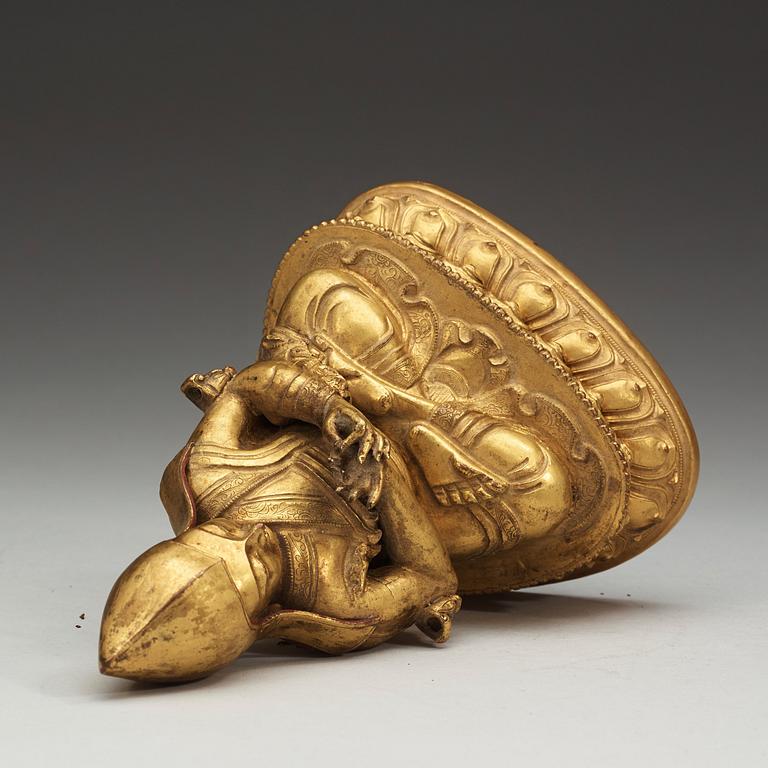 A Sino-Tibetan gilt copper alloy repoussé figure of Tsong Khapa, 18/19th Century.