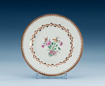 1631. A set of four famille rose dinner plates, Qing dynasty, Qianlong (1736-95).