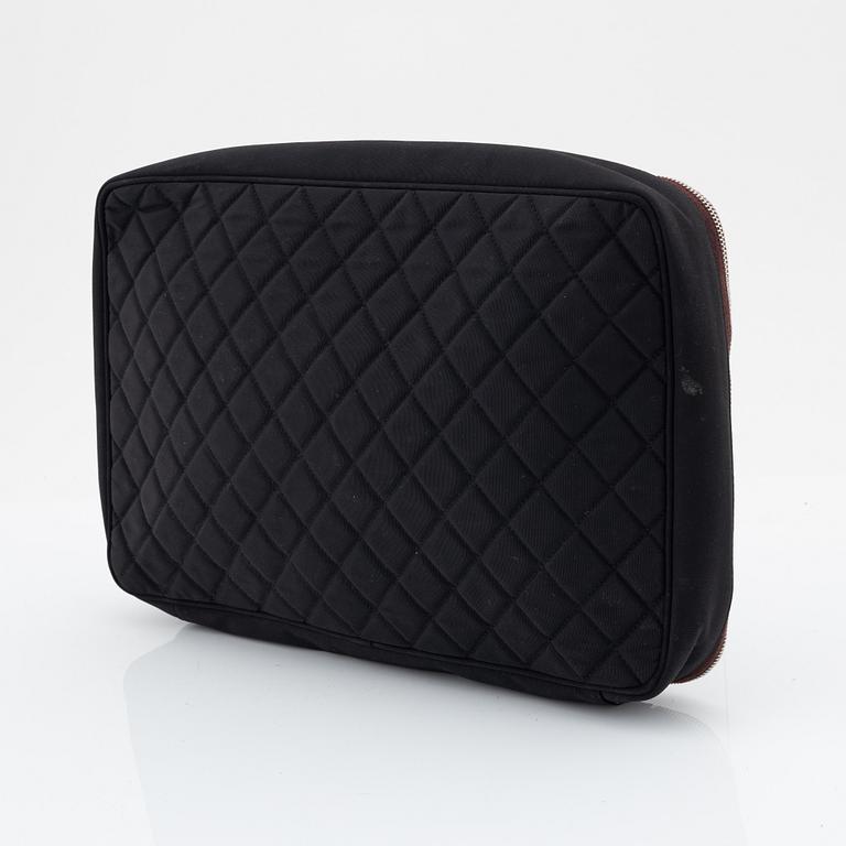 Chanel, a quilted nylon computer case, 2012.