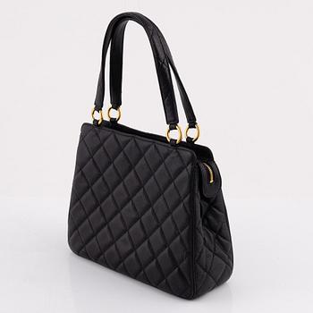 Chanel, a black caviar leather bag, 1997-1999.