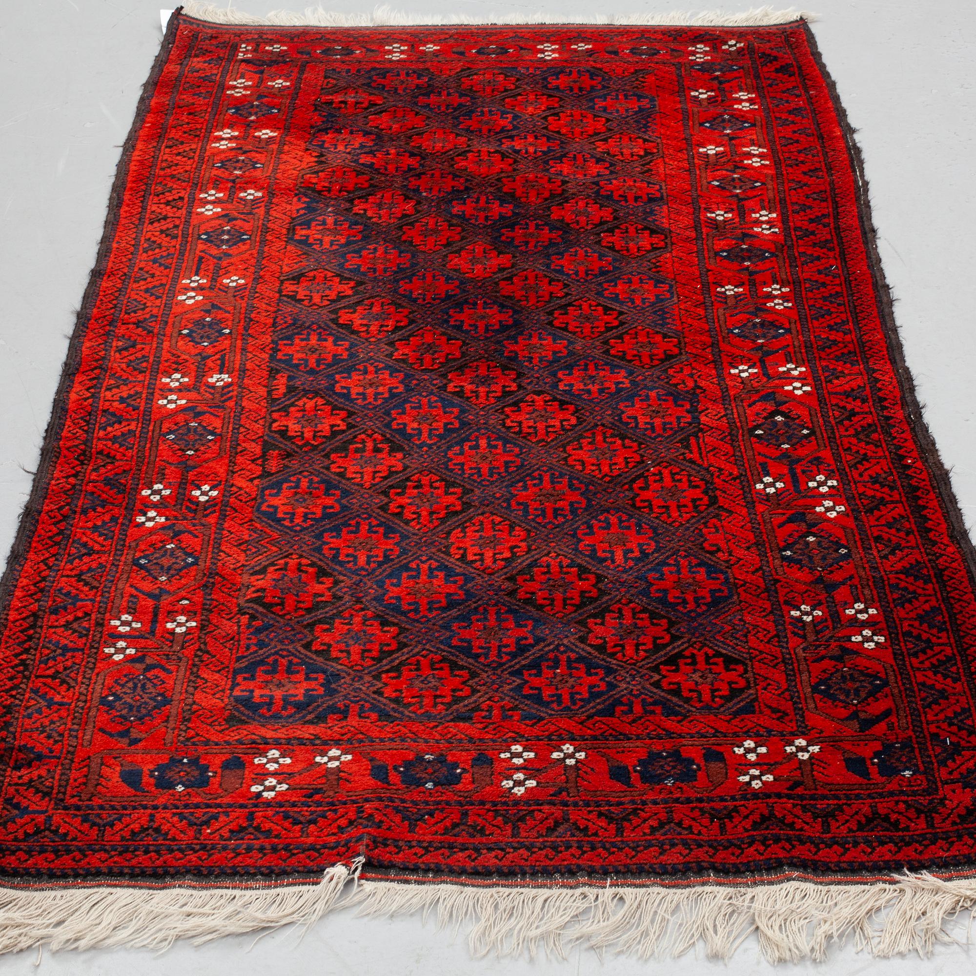 MATTO, a semi-antique Baluch, ca 210 x 110,5 cm (plus flat weave at the ends).