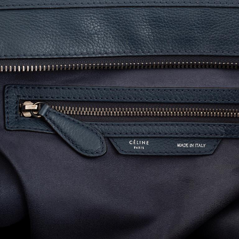 Céline, a teal leather 'Luggage' handbag.