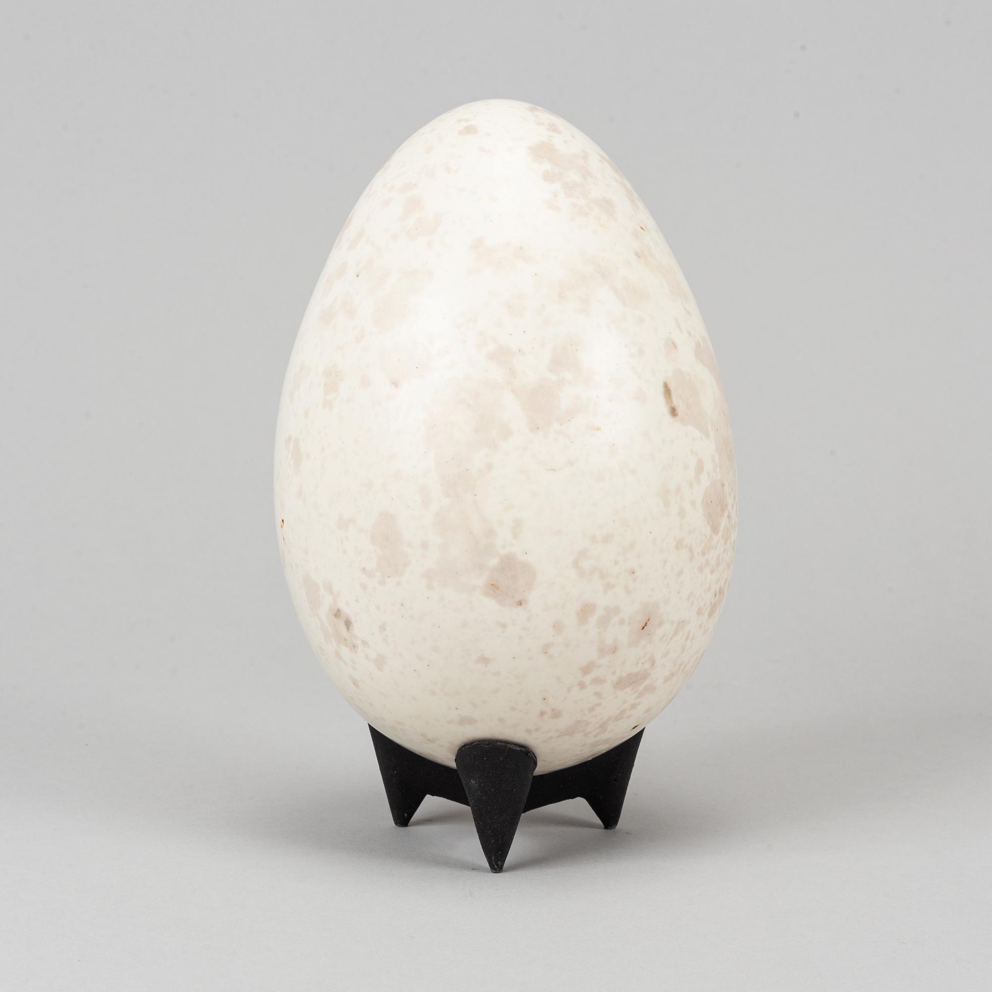 Hans Hedberg, a faience sculpture of an egg and a vase / egg cup, Biot, France.