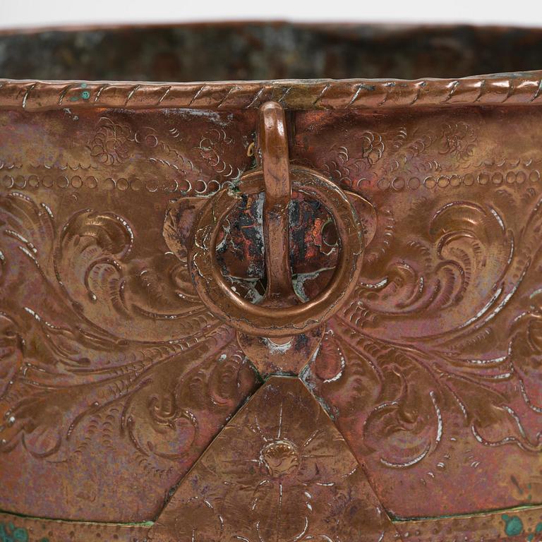 A Swedish baroque repousse copper cauldron, early 18th century.