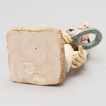 A 1930s ceramic sculpture signed Aja Arabia, Made in Finland.