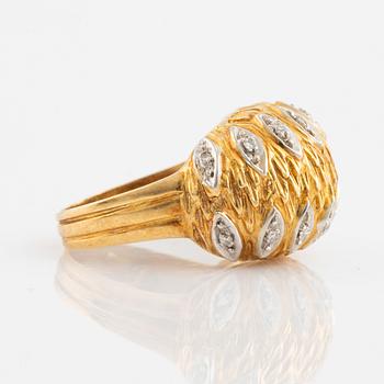 Gold and eight diamond ring.