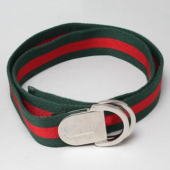 Two Gucci belts.