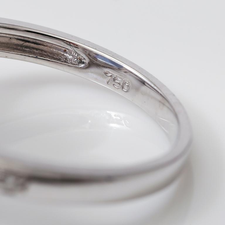 RING, diamanter totalt ca 0,30 ct, blå tanzanit ca 2,60 ct.