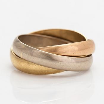 must de Cartier, An 18K gold "Trinity" ring.