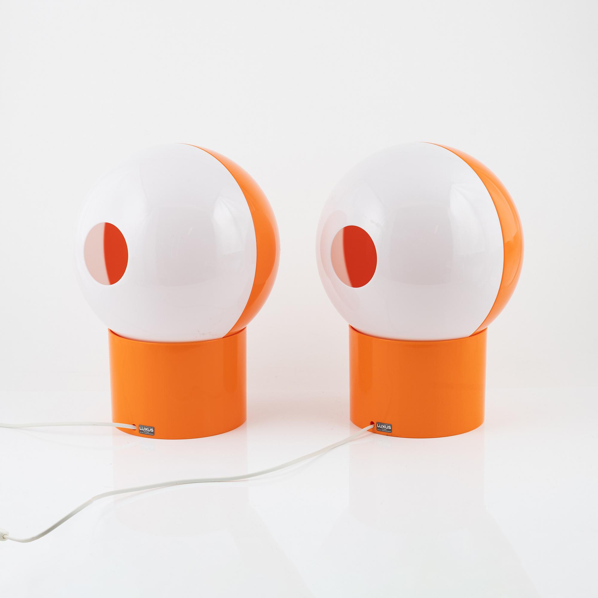 Uno & Östen Kristiansson, a pair of orance plastic 'Luno' model 1241 table lights, Luxus, Vittsjö.