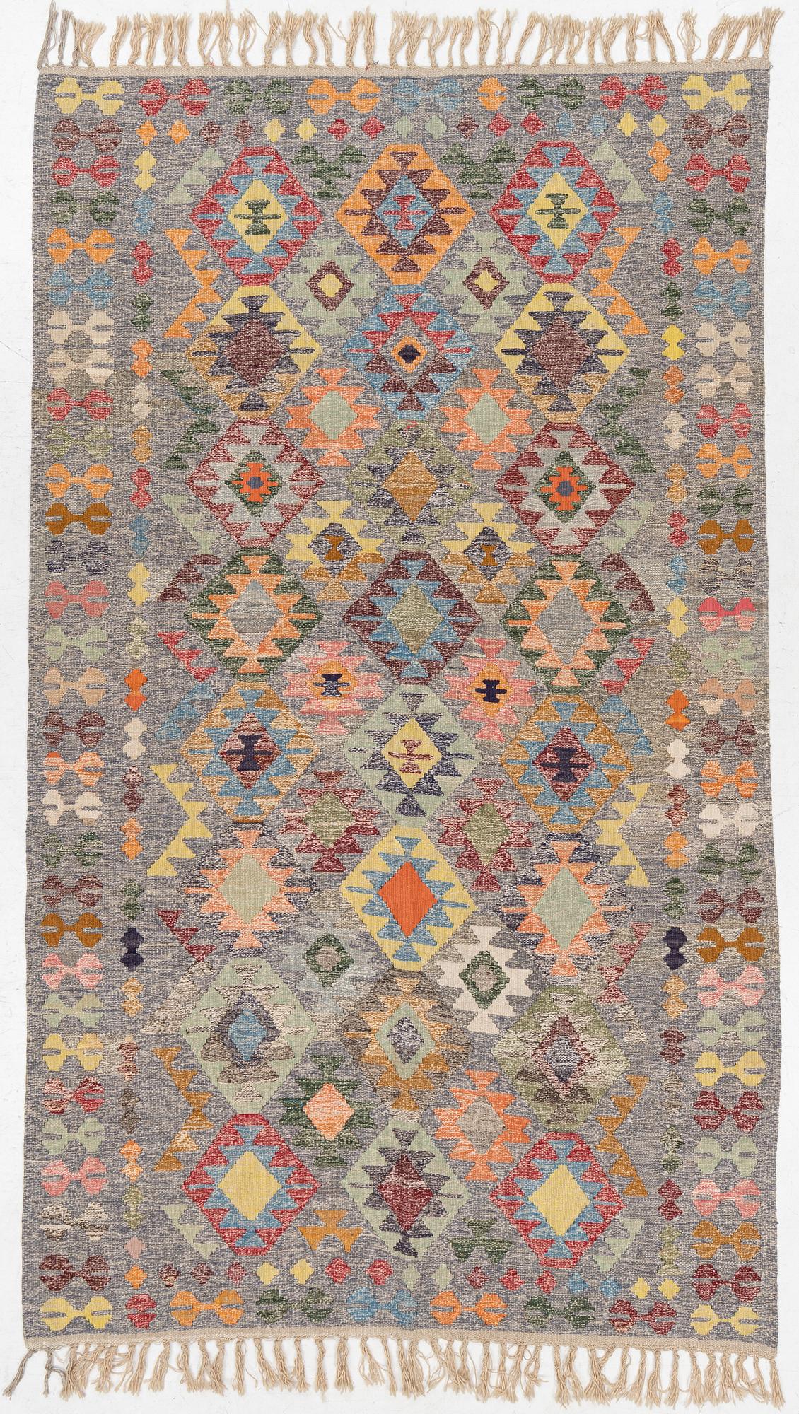 A Kelim carpet, c. 309 x 180 cm.