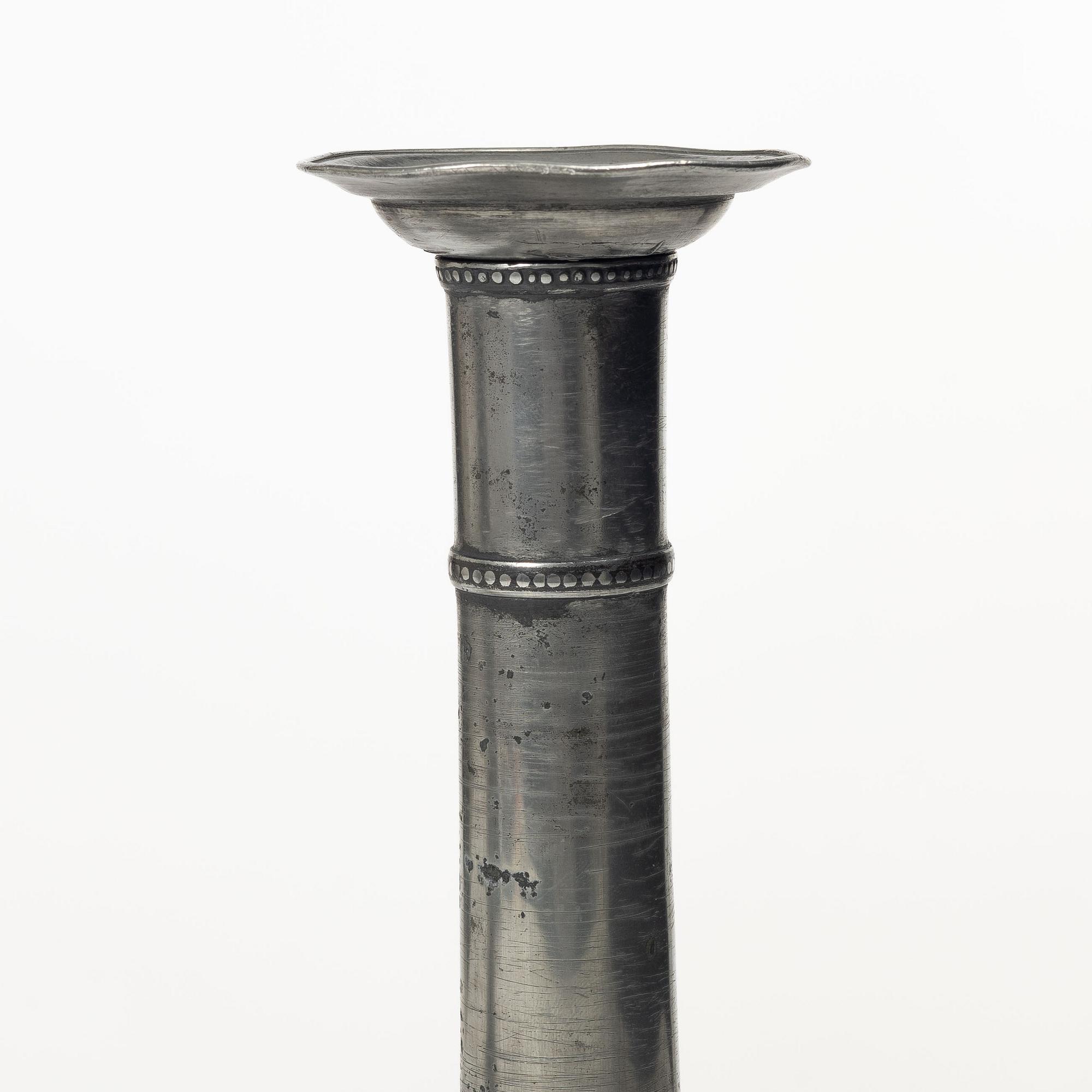 A pair of late gustavian pewter candlesticks attr. to Hans Wicksten (master in Västerås 1782-1810/14).