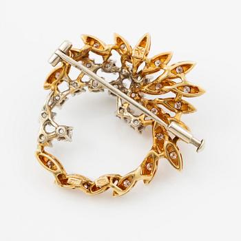 Brosch 18K guld med runda briljantslipade diamanter.