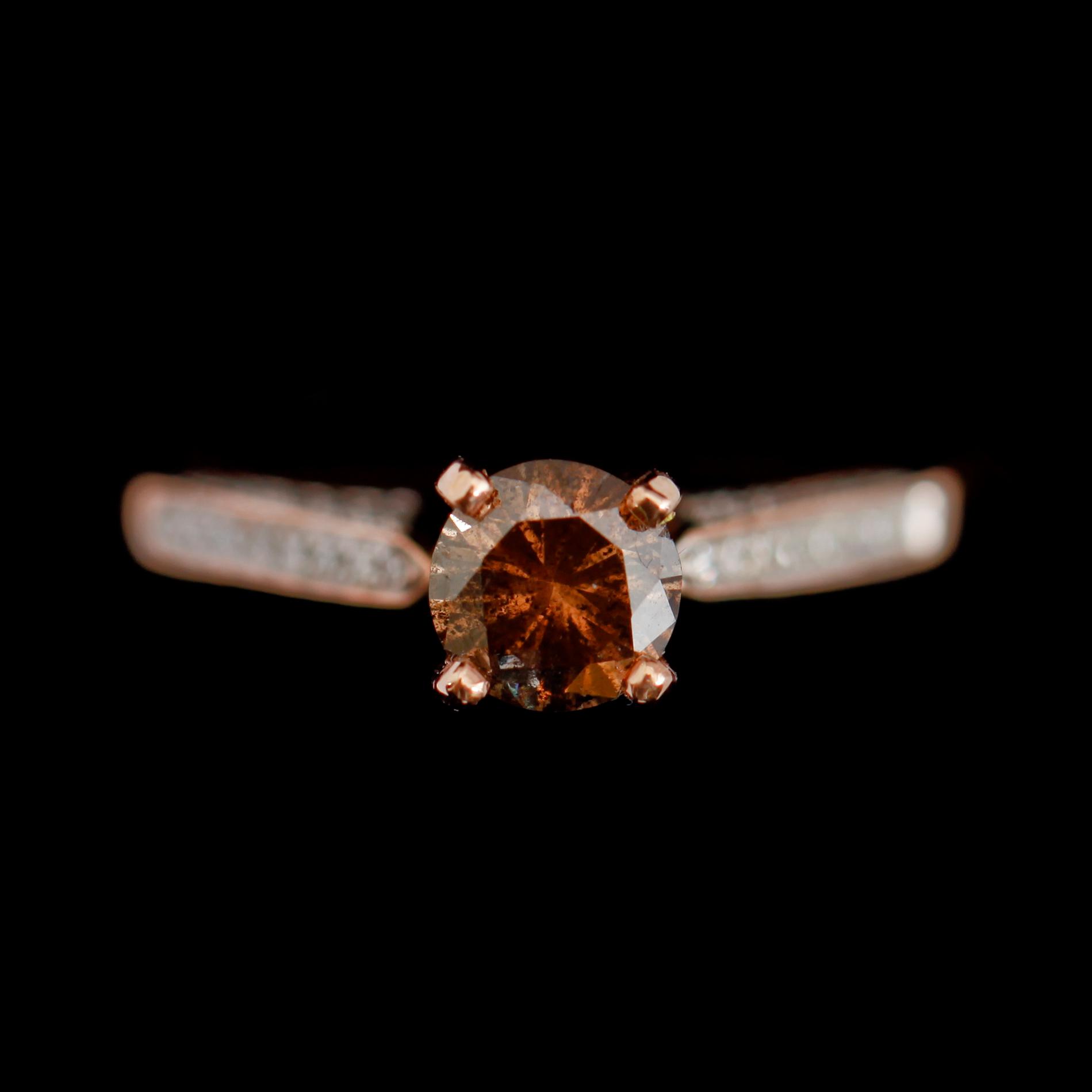 RING, 14 k roseguld, briljantslipade diamanter tot ca 0.95 ct.