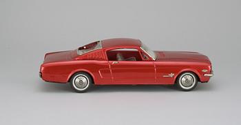 A Japanese Nomura Toys Ford Mustang, 1960s.
