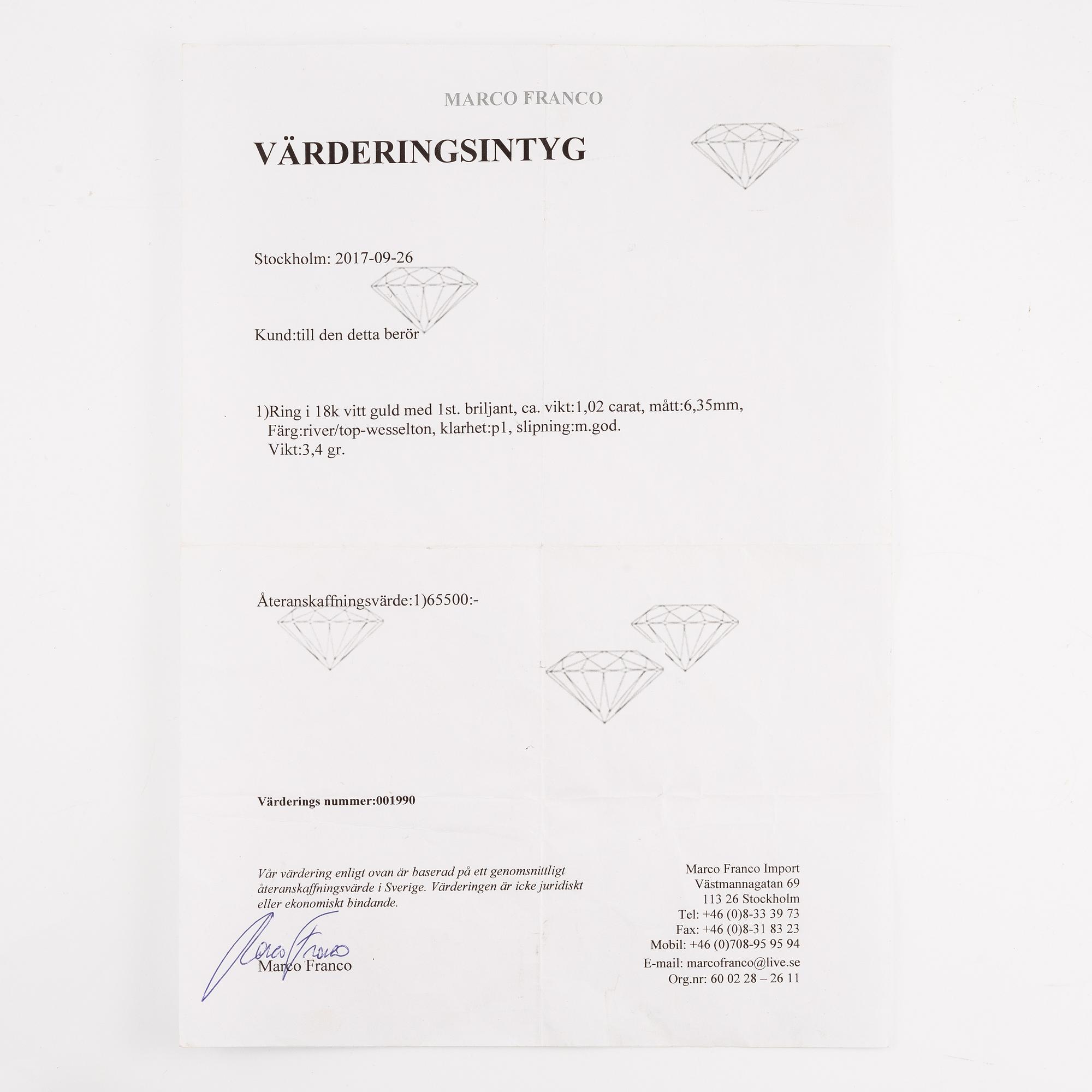 Ring 18K vitguld med briljantslipad diamant.