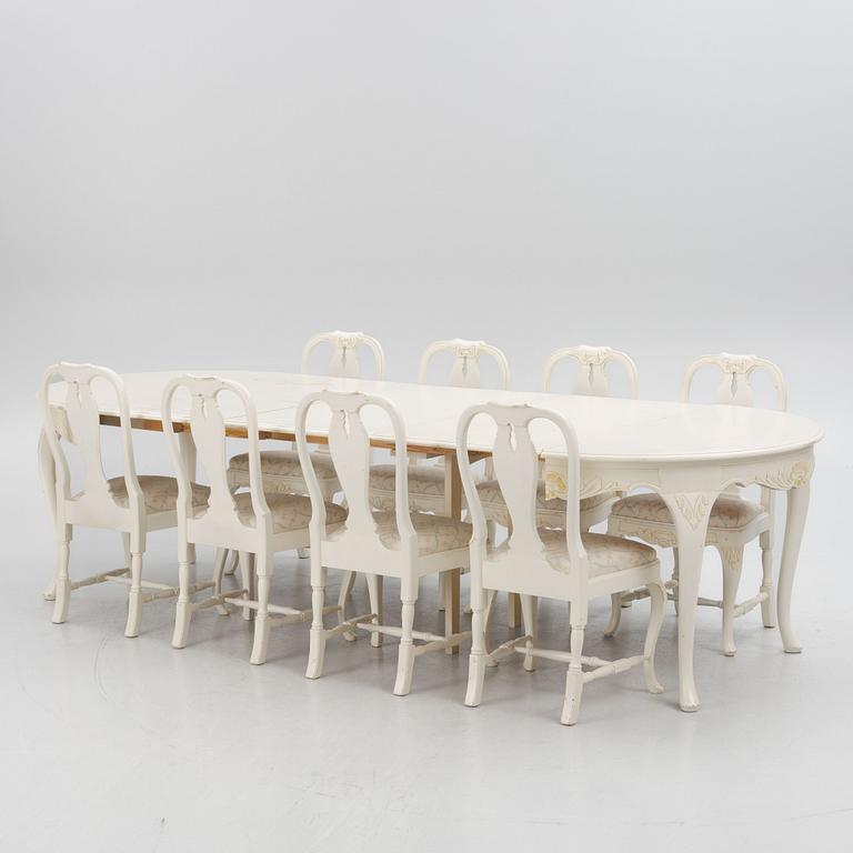 A Rococo style dining table with eight chairs, second half of the 20th century.